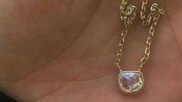 14k yellow gold custom necklace with pear cut white diamond 