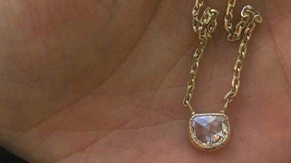 14k yellow gold custom necklace with pear cut white diamond