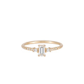 EMERALD CUT DIAMOND MELODY RING