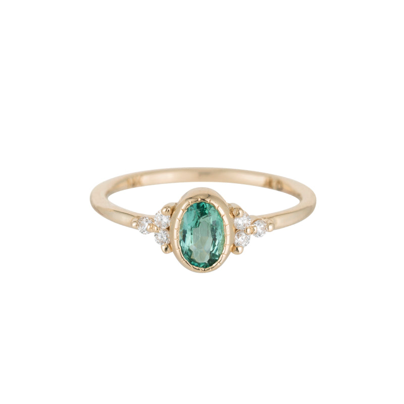 oval emerald cluster ring