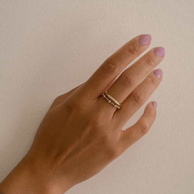 KNIFE EDGE BAGUETTE DIAMOND RING