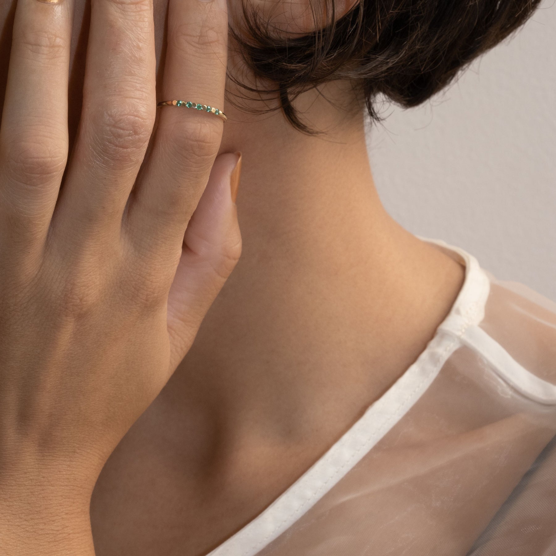 EMERALD PIZZICATO RING