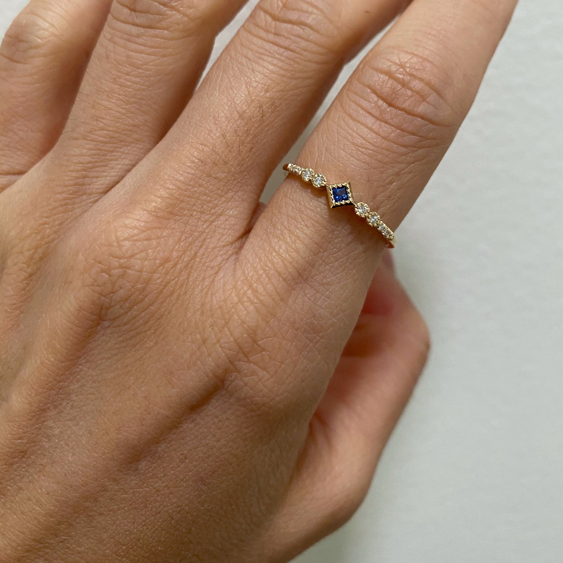 PRINCESS CUT SAPPHIRE JOURNEY RING