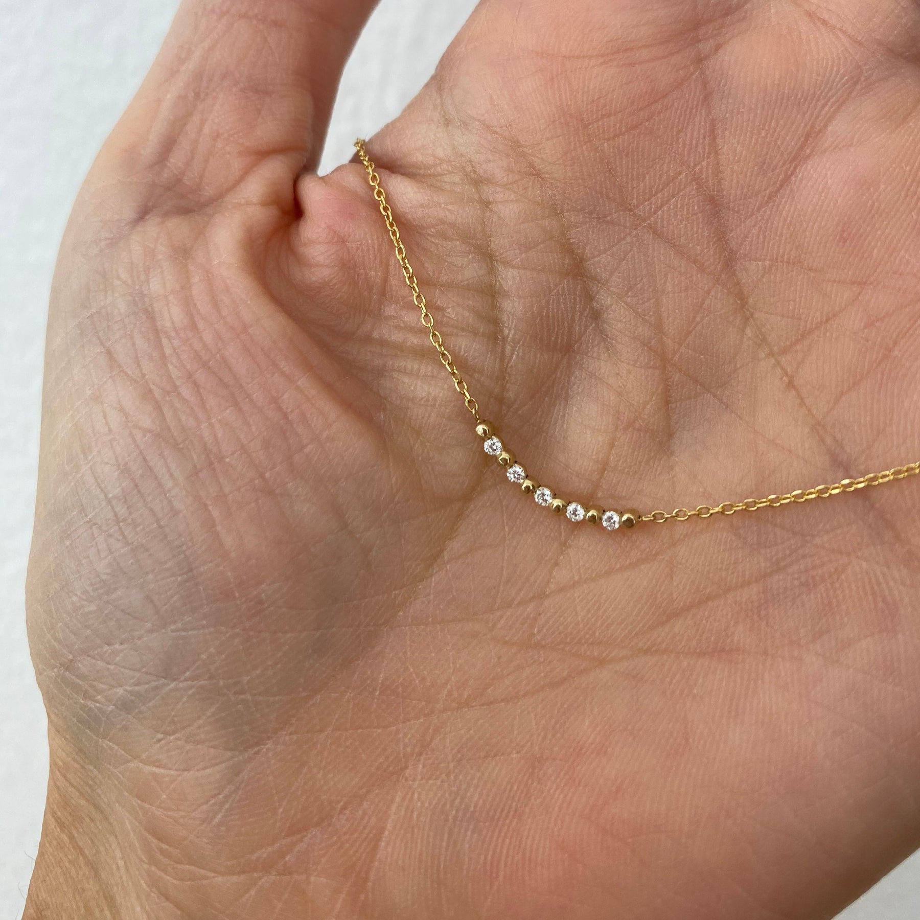 DIAMOND PIZZICATO NECKLACE