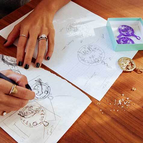 Jennie sketching designs for her pendant for De Beers, inspired by a leopard she saw in Botswana