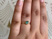 Emerald Tilt Equilibrium Ring