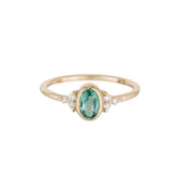 oval emerald cluster ring