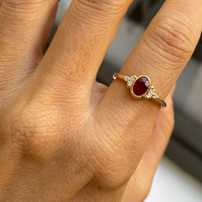 oval ruby cluster ring