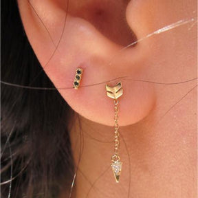 detail, bar studs with black diamonds